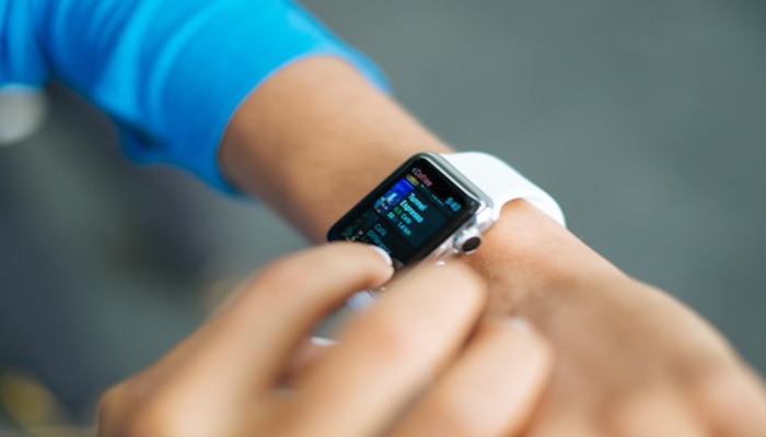 An undated image of a person wearing a smartwatch. — Unsplash