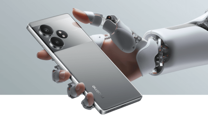 An undated image of a person holding a Realme smartphone. — Realme