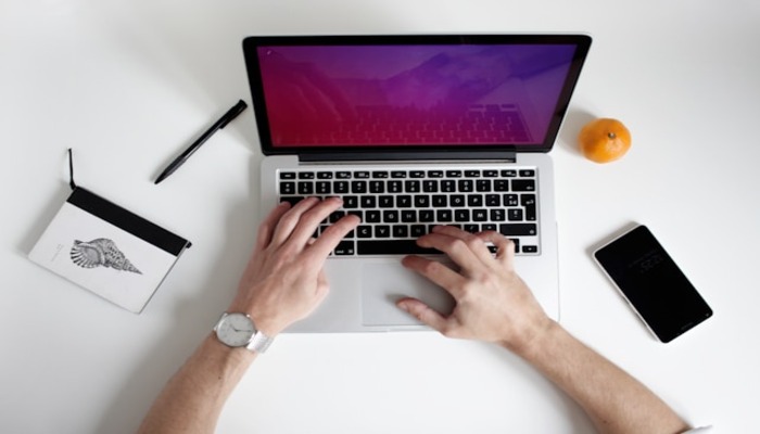 An undated image of a person using a laptop. — Unsplash