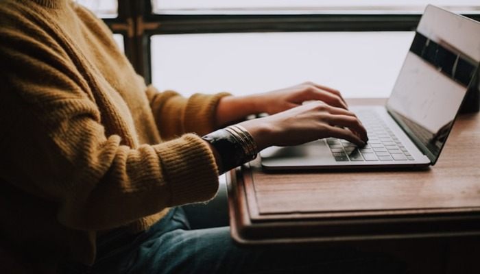 An undated image of a person using a laptop. — Unsplash
