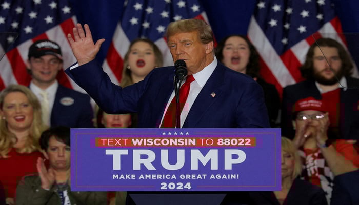 Republican presidential candidate and former US President Donald Trump gestures during a campaign rally in Green Bay, Wisconsin, US.— Reuters
