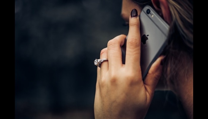 An undated image of a person on call. — Unsplash