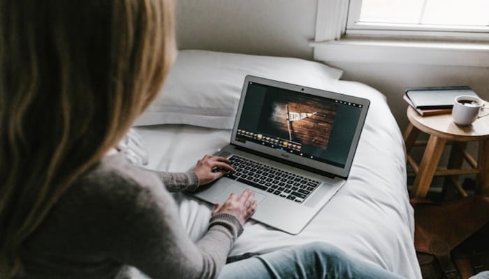 An undated image of a person using a laptop. — Unsplash