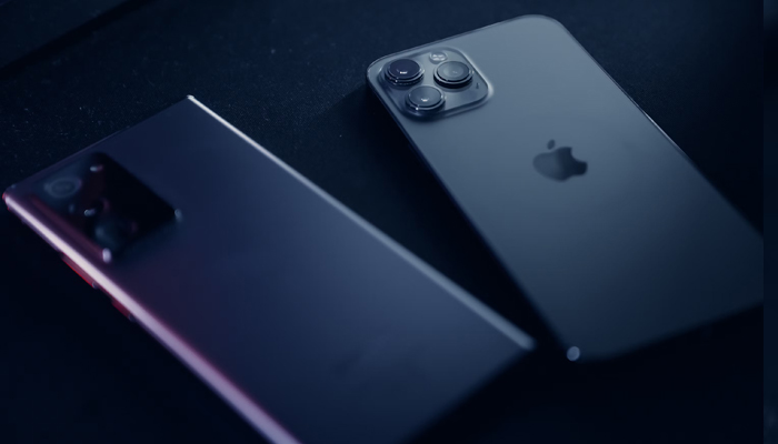 An undated image showing Android mobile along with iPhone. — Unsplash