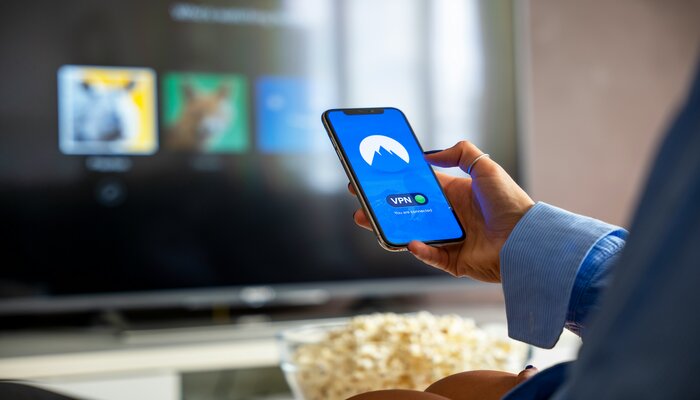 An undated image of a person using VPN on a smartphone. — Unsplash