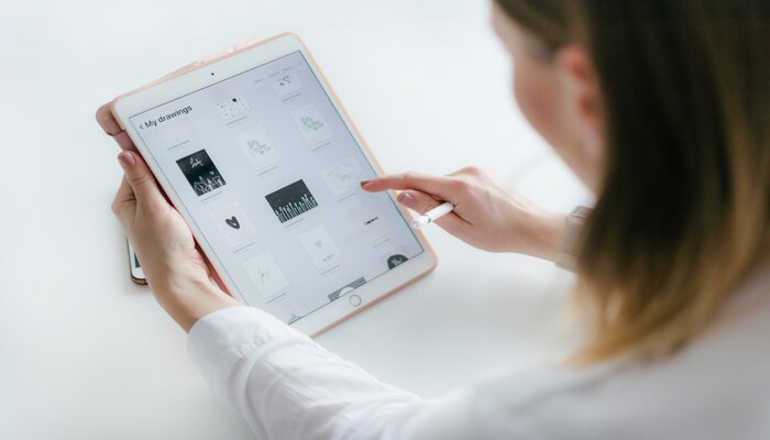 An undated image of a person using a Tablet. — Unsplash