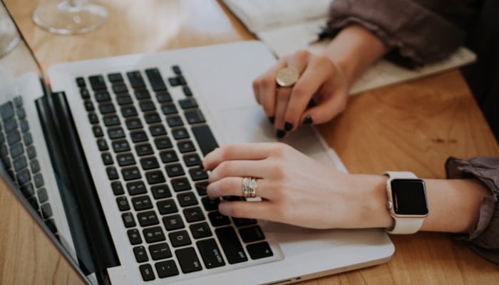 A person using a laptop. — Unsplash