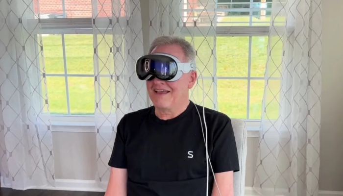 An undated image of Mark using the Vision pro. — Synchron