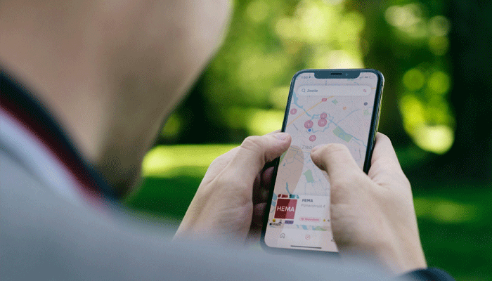 An undated image of a person using Apple Maps on an iPhone. — Unsplash
