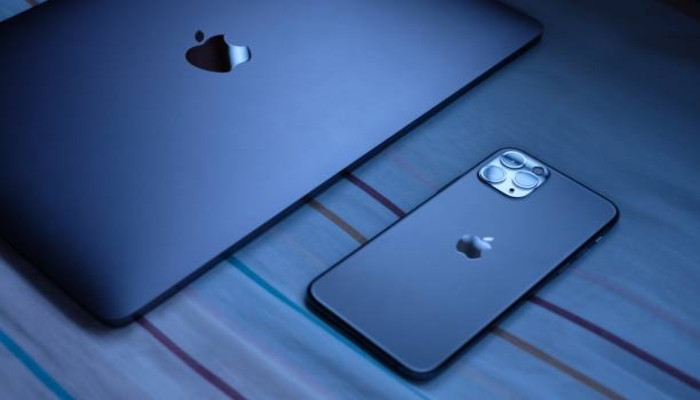 An undated image of a Mac and iPhone. — iStock