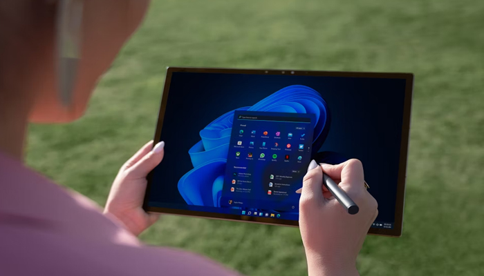 An undated image of a girl using a tablet. — Unsplash