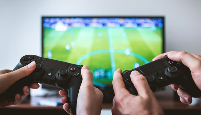 An undated image showing 2 persons playing. — Unsplash