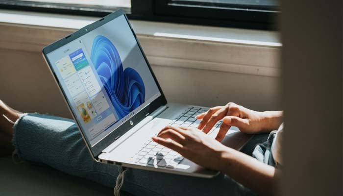 An undated image of a person using a laptop. — Unsplash