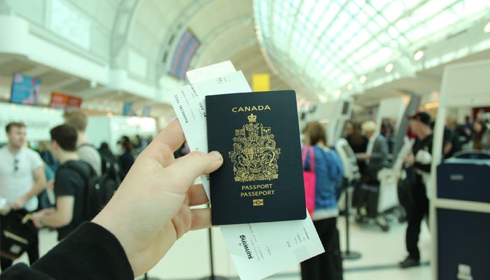 An undated image showing a Canada visa passport. — Unsplash