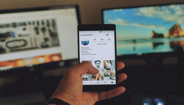 An undated image showing Instagram interface on a smartphone. — Unsplash