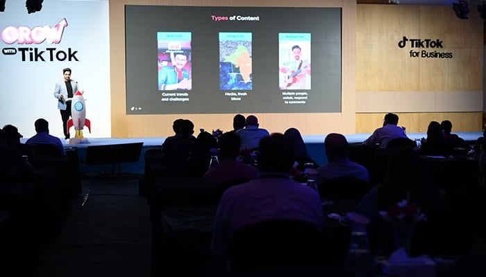 The image shows TikTok Head of Content Operations and Marketing in Pakistan on stage at Grow with TikTok event held on August 31 in Karachi, Pakistan. — Picture by author