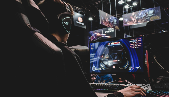 An undated image showing a gamer playing game. — Unsplash