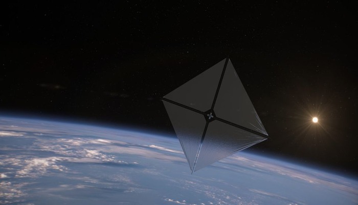An illustration of the artist’s concept shows the Advanced Composite Solar Sail System spacecraft sailing in space. — NASA