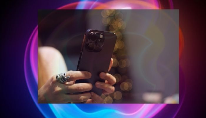 An undated image of a person using an iPhone. — Apple/Canva