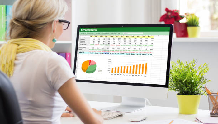 An undated image showing a girl working on Microsoft Excel. — iStock