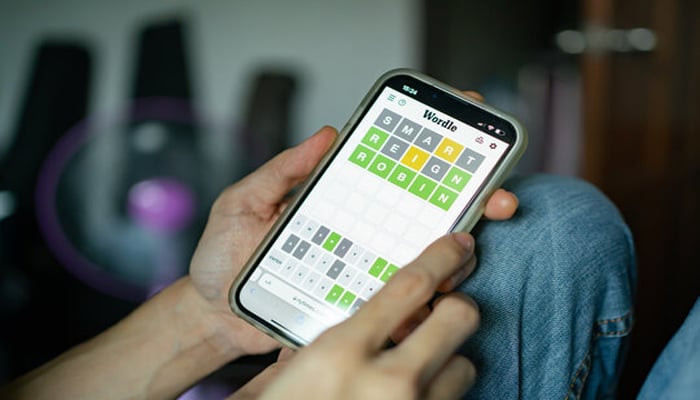 An undated image showing Wordle game on a smartphone. — Adobe Stock