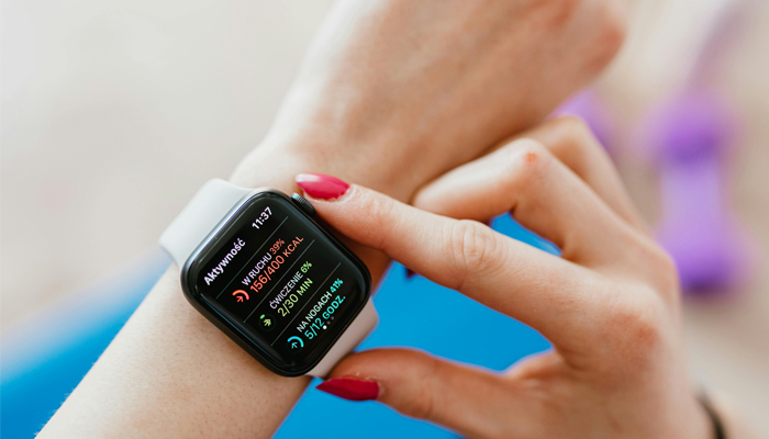 An undated image showing a smartwatch on the wrist of a girl. — Pexels