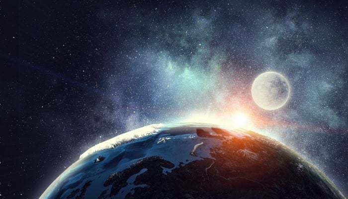 An illustration of Earth and the moon. — Canva