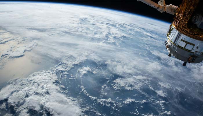 An undated image of a satellite entering into the Earth. — Unsplash