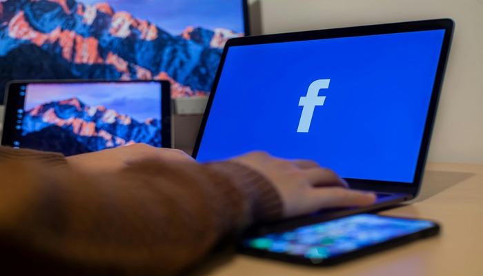 An undated image displaying Facebook logo on a laptop. — Pexels