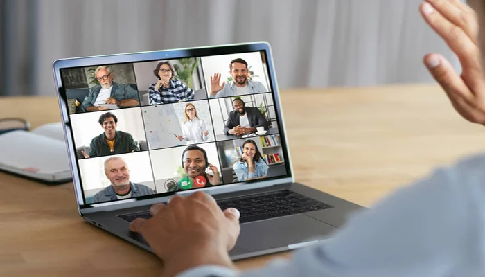 An undated image showing a person video conferencing on Zoom app. — Depositphotos