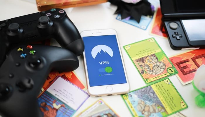An undated image showing VPN interface in a smartphone, along with other gaming things. — Freerange Stock