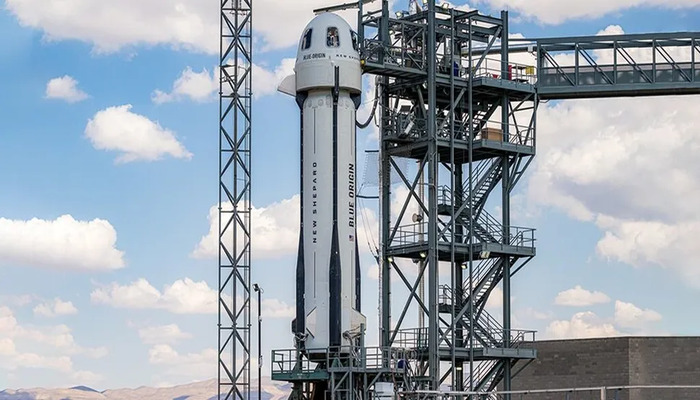 Blue Origins new RSS Karman Line New Shepard rocket and capsule on the launch pad. — Blue Origin