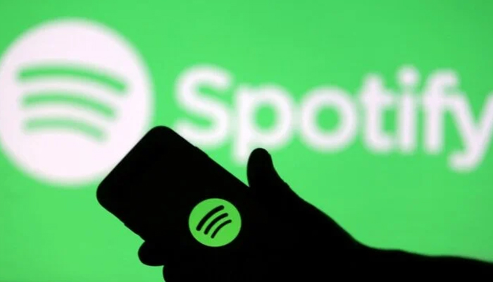 An undated image showing Spotify logo on a smartphone. — ShutterStock
