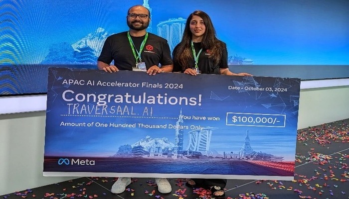 An undated image of Hamza Farooq(left) and Kanwal Mehreen(right) holding Meta AI Accelerator Competition prize in Singapore. — Supplied