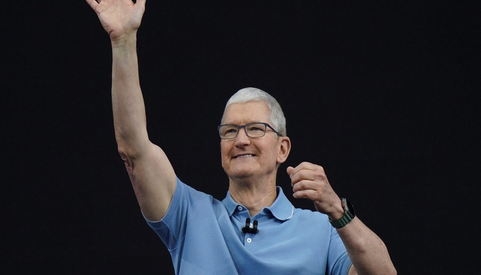 Tim Cook gestures at Apples annual Worldwide Developers Conference at the companys headquarters in Cupertino, California, U.S. June 5, 2023. — REUTERS