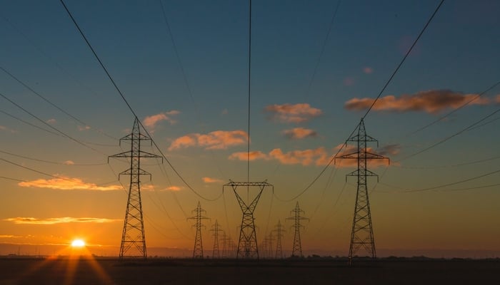 An undated image of electricity towers. — Unsplash