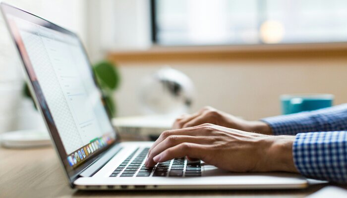 An undated image of a person using a laptop. — Unsplash