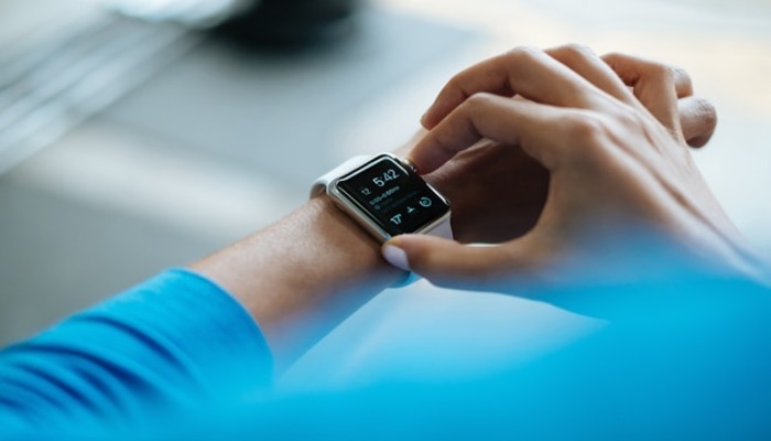An undated image of a person wearing Apple Watch. — Unsplash