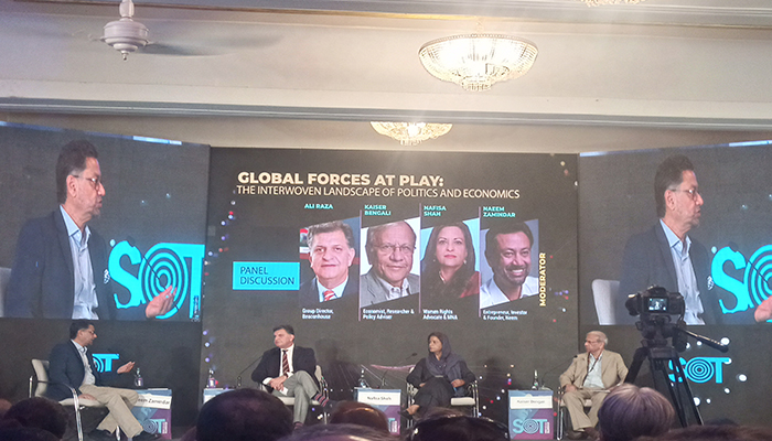 A still from a panel discussion titled Global Forces at Play: The Interwoven Landscape of Politics and Economics held at each Luxury Hotel on November 2, 2024. — Photo by author