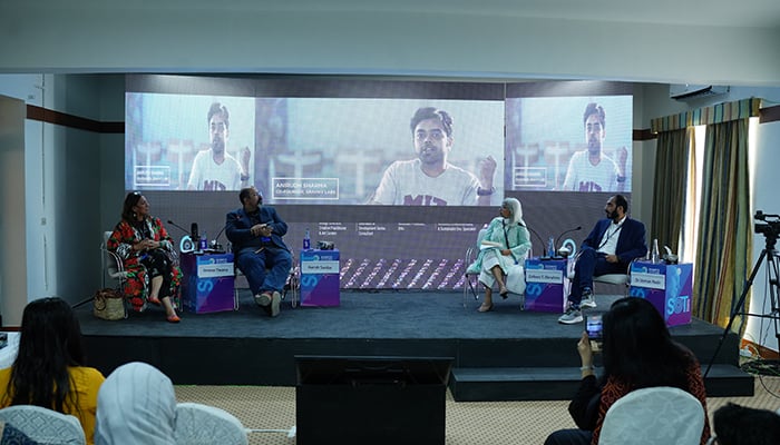 An image of panelists discussing climate sustainability powered by AI in Pakistan at SOT event in Beach Luxury Hotel on November 3, 2024. — Photo by author