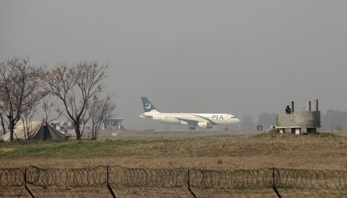A Pakistan International Airlines (PIA) passenger plane prepares to take off from the Benazir International airport in Islamabad, Pakistan, February 9, 2016. — Reuters