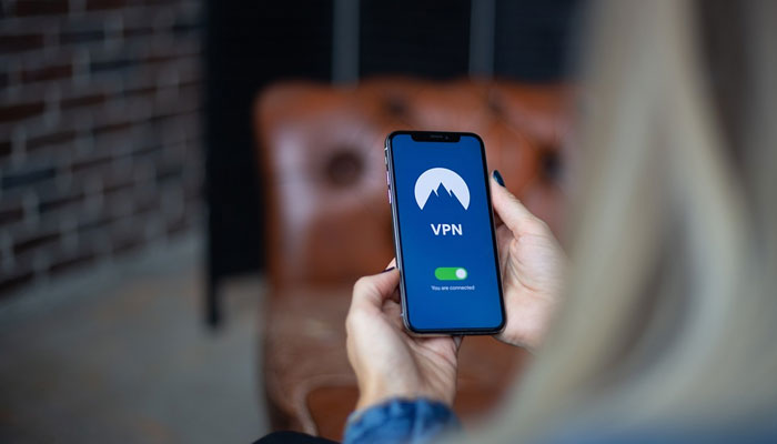 An undated image of a person switching on VPN on mobile phone. — Pixabay