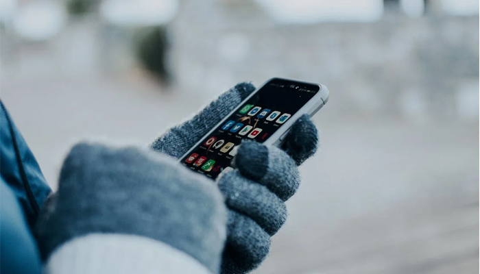 An undated image of a person using smart phone . — Pexels