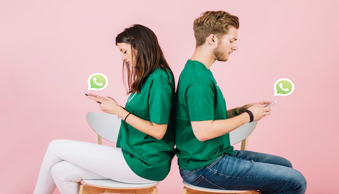 An undated image of two people using WhatsApp. — Freepik