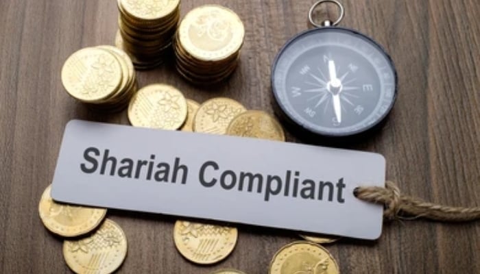 A undated image of Shariah Compliant, along with coins and campus. — Shutterstock