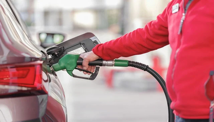 An undated image of a person fueling up a car. — Pixbay