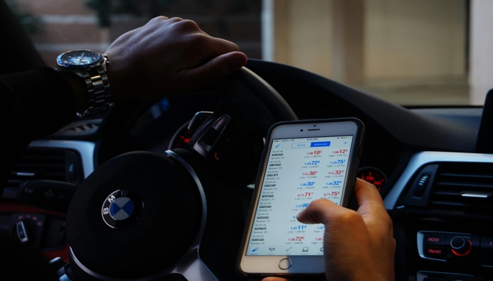 An undated image of a trading app open on a mobile screen. — Pexels