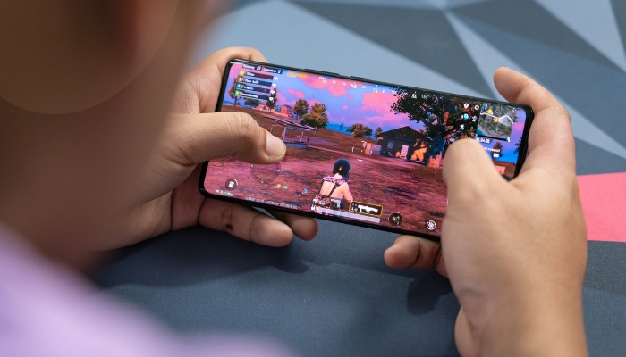 An undated image of a person playing PUBG on his phone. — Unsplash