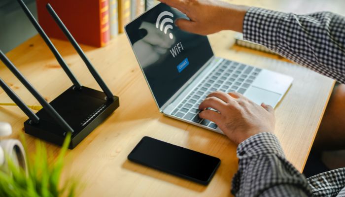 An undated image of a person using laptop. — Canva