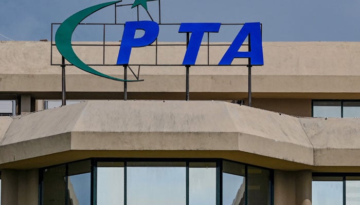 A logo of the Pakistan Telecommunication Authority (PTA) is seen on its headquarters building in Islamabad on August 16, 2024. — AFP